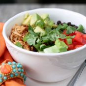 Slow Cooker Chicken Enchilada Rice Bowls from www.thisgalcooks.com. The chicken cooks in a #slowcooker, the rice in a rice cook slider