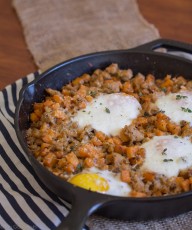 Sausage and Sweet Potato Hash with Baked Eggs - This Gal Cooks. A savory breakfast dish made with chicken sausage. #healthy #breakfast #sweetpotato