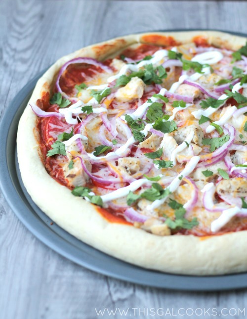 My favorite Tex-Mex flavors come together to make this easy Chicken Enchilada Pizza. Perfect for easy weeknight dinners! | This Gal Cooks