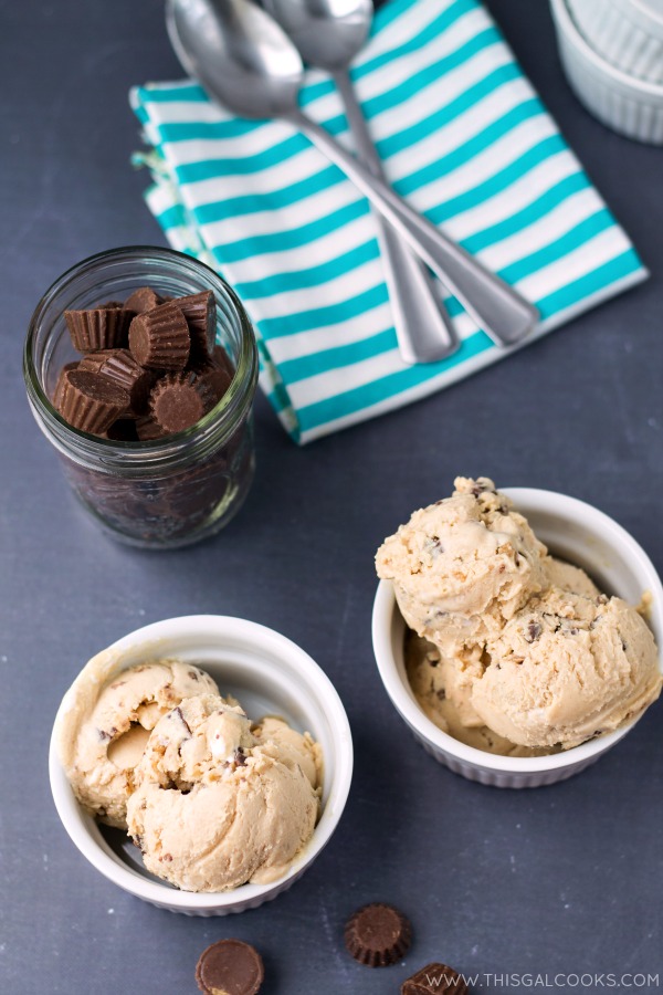 Fluffernutter Peanut Butter Cup Ice Cream. Homemade Ice Cream made with peanut butter, marshmallow fluff and peanut butter cups! From www.thisgalcooks.com #peanutbutter #icecream