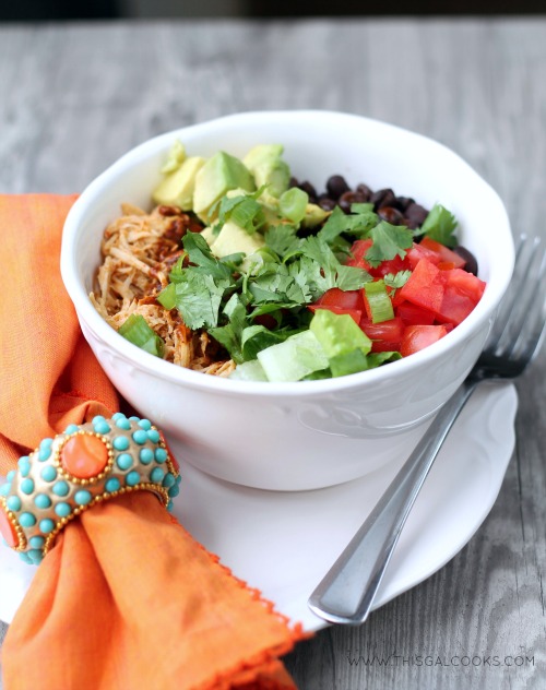 Slow Cooker Chicken Enchilada Rice Bowls from www.thisgalcooks.com. The chicken cooks in a #slowcooker, the rice in a rice cooker and all you have to do is make the sauce and prepare your toppings5WM