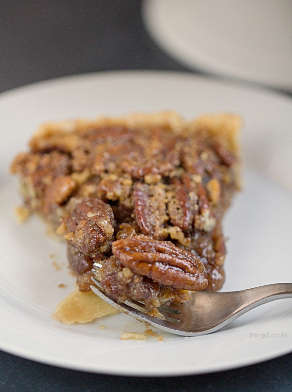 Classic Pecan Pie Tart - This Gal Cooks. This pecan pie is spiced up with the addition of cinnamon and spiced rum!