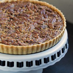 Classic Pecan Pie Tart - This Gal Cooks. This pecan pie is spiced up with the addition of cinnamon and spiced rum!