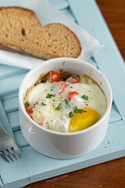 Baked Eggs with Quinoa and Fresh Salsa - This Gal Cooks. A fresh, healthy breakfast option. Packed with protein, veggies and grains.
