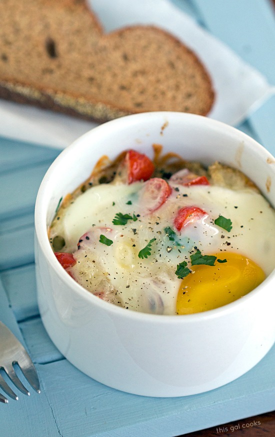 Baked Eggs with Quinoa and Fresh Salsa - This Gal Cooks. A fresh, healthy breakfast option. Packed with protein, veggies and grains.