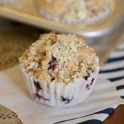 Healthier Blueberry Muffins - This Gal Cooks. Tasty muffins made with whole wheat, flax, honey, Greek Yogurt and blueberries. Topped with chopped almonds.