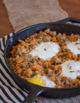 Sausage and Sweet Potato Hash with Baked Eggs - This Gal Cooks. A savory breakfast dish made with chicken sausage. #healthy #breakfast #sweetpotato