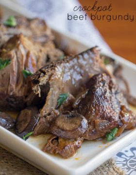 Crock Pot Beef Burgundy - This Gal Cooks. Tasty beef roast is seasoned, browned and slow cooked with red wine and onions to give you a hearty meal that the whole family will enjoy.