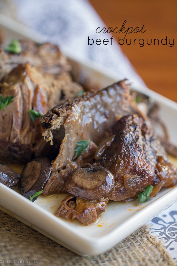 Crock Pot Beef Burgundy - This Gal Cooks. Tasty beef roast is seasoned, browned and slow cooked with red wine and onions to give you a hearty meal that the whole family will enjoy.
