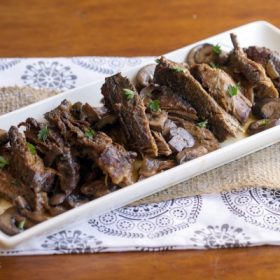 Crock Pot Beef Burgundy - This Gal Cooks. Tasty beef roast is seasoned, browned and slow cooked with red wine and onions to give you a hearty meal that the whole family will enjoy.