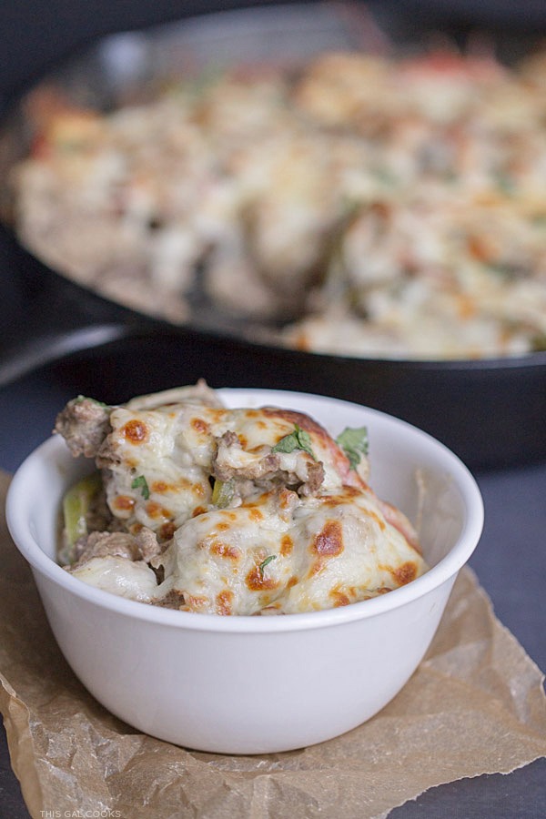 Thirty Minute Philly Cheeseburger Gnocchi Bake: Low fat cream cheese, lean ground beef and whole wheat gnocchi come together to create this quick and easy one pan skillet dinner.