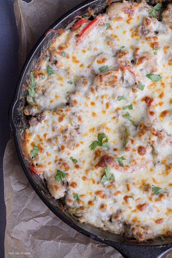 Thirty Minute Philly Cheeseburger Gnocchi Bake: Low fat cream cheese, lean ground beef and whole wheat gnocchi come together to create this quick and easy one pan skillet dinner.