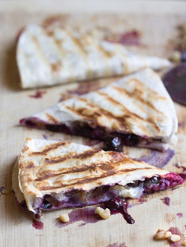Creamy brie cheese, walnuts and fresh blueberries come together to make this crazy good Blueberry Brie Walnut Quesadilla. Perfect for breakfast or dessert!