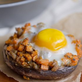 Sausage + Sweet Potato Stuffed Portabello: Chicken Sausage and diced sweet potatoes are sautéed in Italian seasonings, stuffed into portabellos, topped with an egg and baked to perfection.