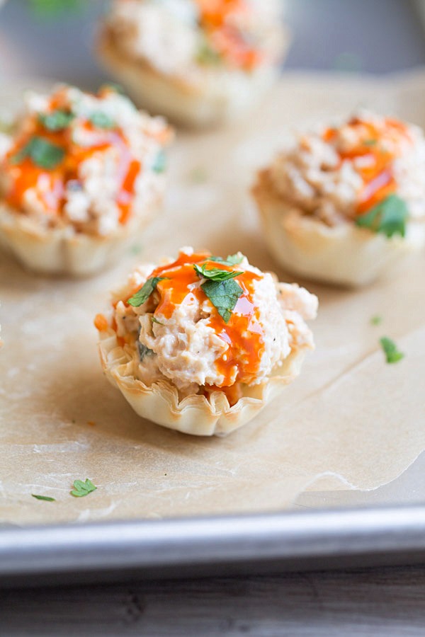 Buffalo Chicken Salad Cups. These crispy little appetizer cups are big on flavor and perfect for every wing lover in your life! Great for game day too! | This Gal Cooks