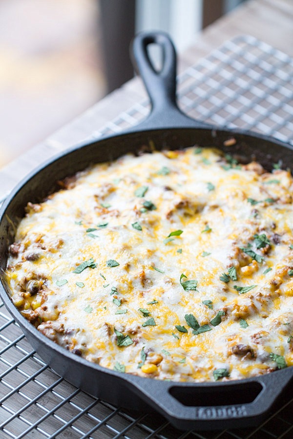 Easy Beef Tex Mex Skillet Casserole is my new favorite dinner! Cheesy, beefy and full of flavor. | This Gal Cooks
