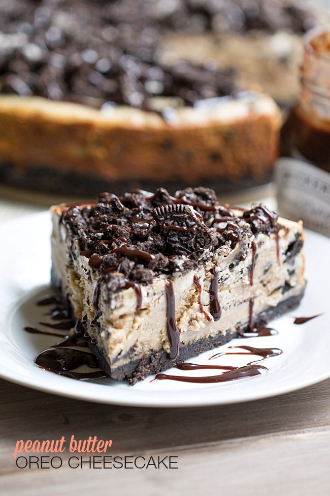 The BEST Peanut Butter Oreo Cheesecake. This creamy peanut butter cheesecake is filled and topped with Oreo cookies and drizzled with hot fudge! | This Gal Cooks