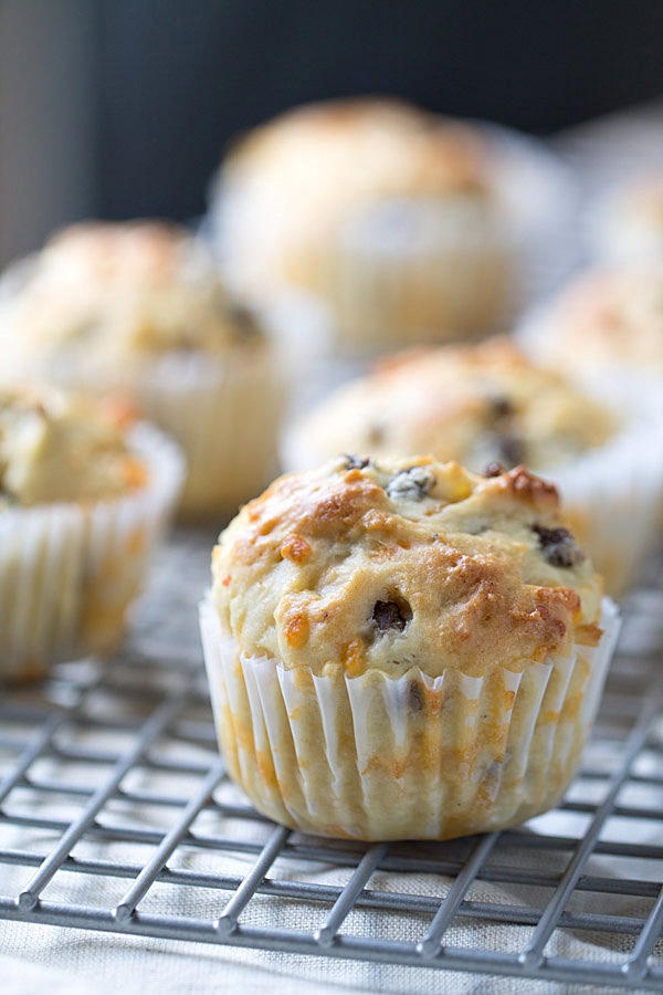 We LOVE to begin our day with these savory Sausage Cheddar and Olive Oil Muffins. Perfect for a quick breakfast or to enjoy with a cup of coffee! | This Gal Cooks #PantryInsiders