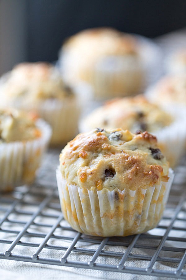 We LOVE to begin our day with these savory Sausage Cheddar and Olive Oil Muffins. Perfect for a quick breakfast or to enjoy with a cup of coffee! | This Gal Cooks #PantryInsiders