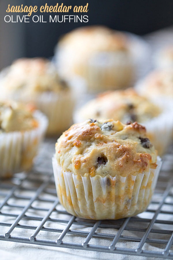 We LOVE to begin our day with these savory Sausage Cheddar and Olive Oil Muffins. Perfect for a quick breakfast or to enjoy with a cup of coffee! | This Gal Cooks #PantryInsiders