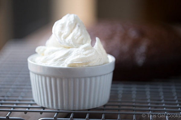 Simple Vanilla Bean Buttercream Frosting. Perfect for topping cakes and cupcakes. | This Gal Cooks