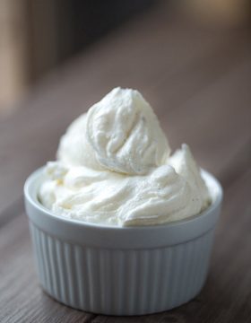 Simple Vanilla Bean Buttercream Frosting. Perfect for topping cakes and cupcakes. | This Gal Cooks