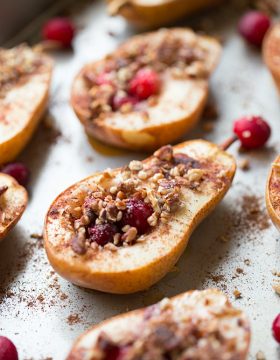 Baked Pears with Honey, Cranberries and Pecans is a super simple and healthy dessert recipe. These delicious pears are seasoned with cinnamon and nutmeg for an extra boost of guilt free flavor!