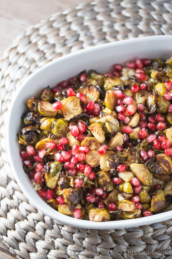 Roasted Brussels Sprouts and shallots are tossed with balsamic vinegar, topped over a bed of fluffy quinoa and then sprinkled with fresh pomegranate!