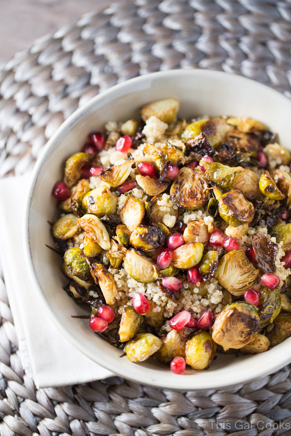 Roasted Brussels Sprouts and shallots are tossed with balsamic vinegar, topped over a bed of fluffy quinoa and then sprinkled with fresh pomegranate!