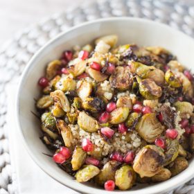 Roasted Brussels Sprouts and shallots are tossed with balsamic vinegar, topped over a bed of fluffy quinoa and then sprinkled with fresh pomegranate!