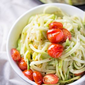 Simple and healthy, these zucchini noodles are paired with roasted tomatoes and a light white wine sauce. Cooked in one skillet to cut back on the clean-up.