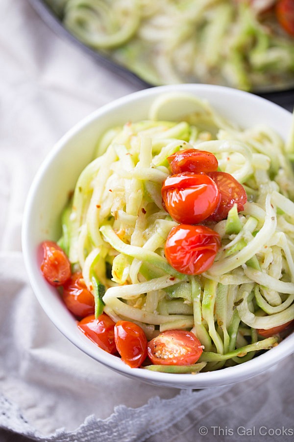 Simple and healthy, these zucchini noodles are paired with roasted tomatoes and a light white wine sauce. Cooked in one skillet to cut back on the clean-up.