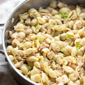 One Pan Chicken Bacon Honey Mustard Pasta is a delicious and simple one pot meal that's perfect for those busy weeknights. Creamy honey mustard is tossed with chicken, bacon, swiss and pasta. It's comfort food in a pan!