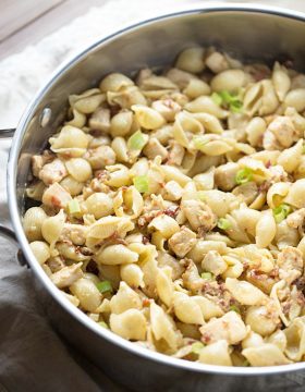 One Pan Chicken Bacon Honey Mustard Pasta is a delicious and simple one pot meal that's perfect for those busy weeknights. Creamy honey mustard is tossed with chicken, bacon, swiss and pasta. It's comfort food in a pan!