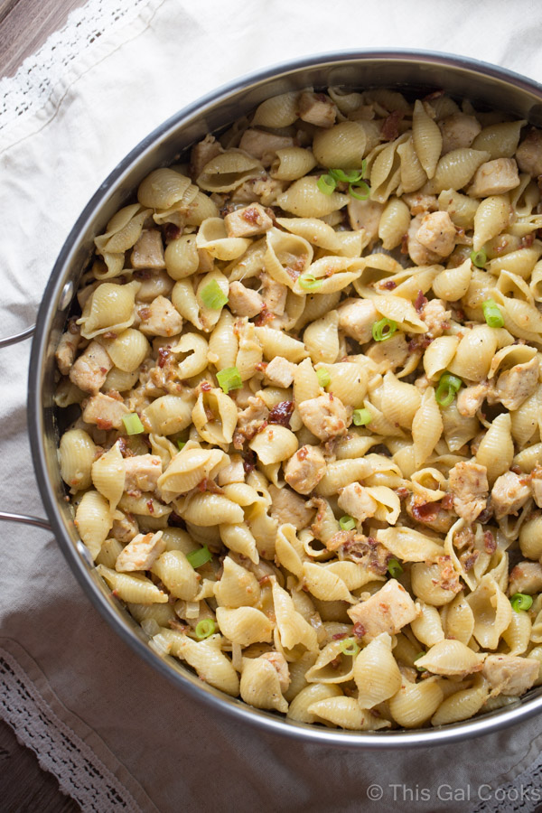 One Pan Chicken Bacon Honey Mustard Pasta is a delicious and simple one pot meal that's perfect for those busy weeknights. Creamy honey mustard is tossed with chicken, bacon, swiss and pasta. It's comfort food in a pan!