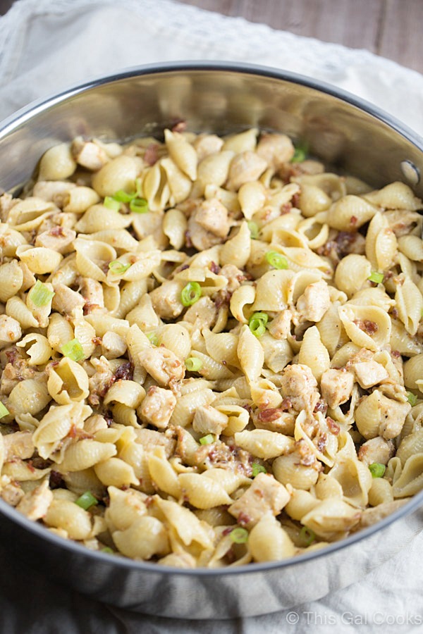 One Pan Chicken Bacon Honey Mustard Pasta is a delicious and simple one pot meal that's perfect for those busy weeknights. Creamy honey mustard is tossed with chicken, bacon, swiss and pasta. It's comfort food in a pan!