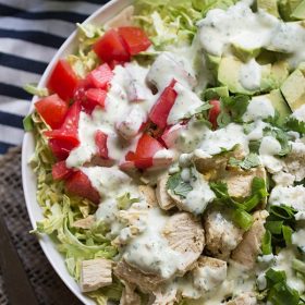 Shaved Brussels Sprout Salad with Creamy Cilantro Dressing is a simple and flavorful salad that's perfect for lunch or a light dinner. This salad is packed with chicken, avocado, tomatoes and queso fresco!