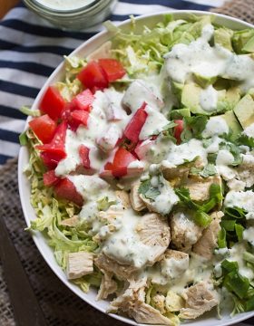 Shaved Brussels Sprout Salad with Creamy Cilantro Dressing is a simple and flavorful salad that's perfect for lunch or a light dinner. This salad is packed with chicken, avocado, tomatoes and queso fresco!