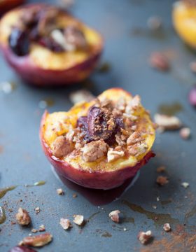 These delicious baked peaches are baked with sweet cherries, pecans, cinnamon and nutmeg and honey. Then they're topped with baked brie cheese. SO good and a healthier option for dessert, too!