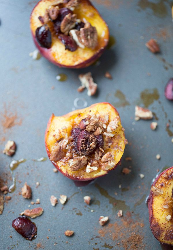 Baked Peaches with Cherries and Pecans. A healthier dessert option with under 100 calories per serving!