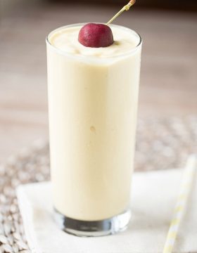 This dairy free Pina Colada Smoothie is full of pineapple, coconut milk and mango. So smooth and creamy and perfect for breakfast, too!