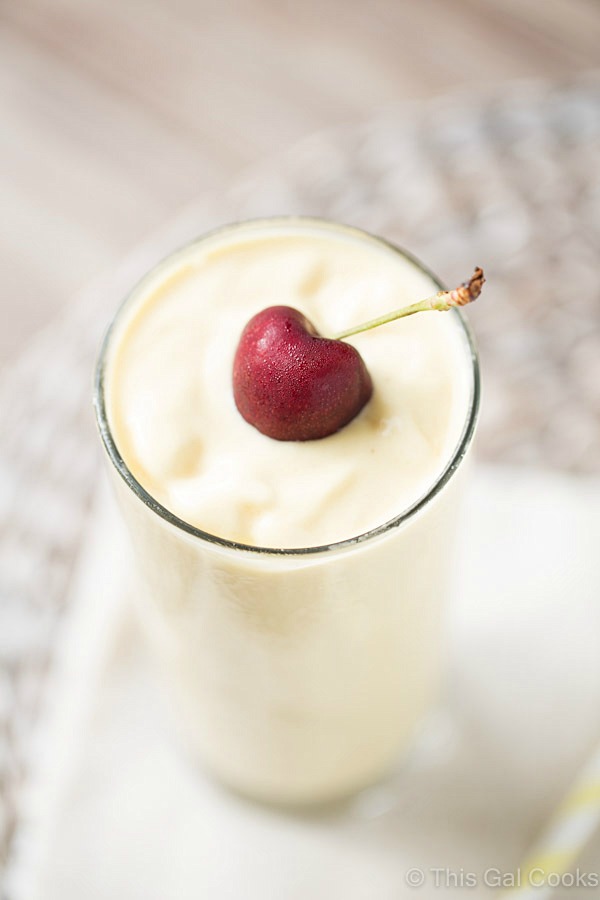 This dairy free Pina Colada Smoothie is full of pineapple, coconut milk and mango. So smooth and creamy and perfect for breakfast, too!