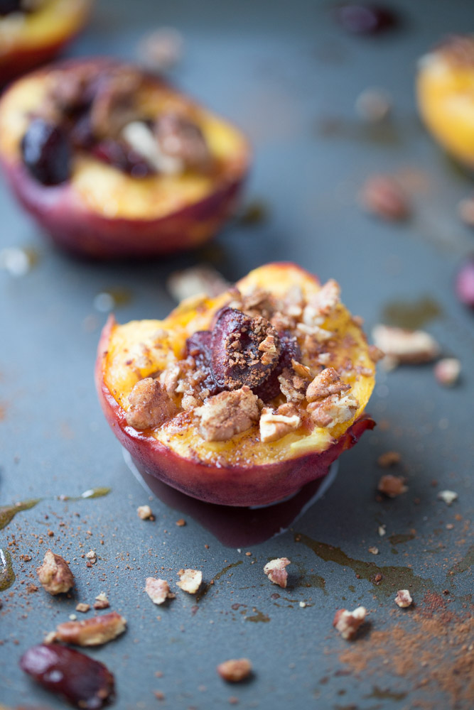 Baked Peaches with Cherries and Pecans. A healthier dessert option with under 100 calories per serving!