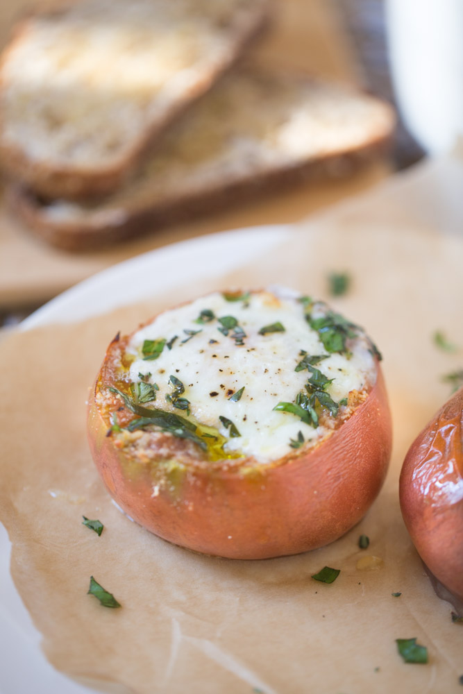 Heirloom tomatoes with baked eggs are a simple and nutritious vegetarian breakfast option. Ready in 20 minutes. Only 130 calories per serving.