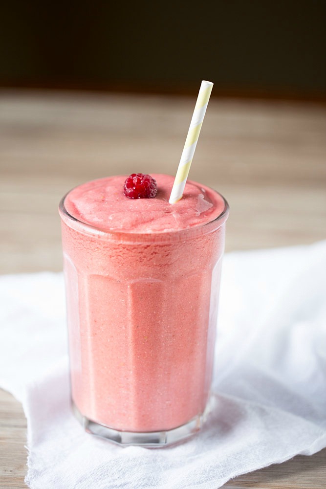 Dairy free, simple and easy to make Tropical Raspberry Coconut Smoothie | This Gal Cooks