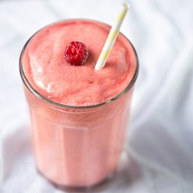 Dairy free, simple and easy to make Tropical Raspberry Coconut Smoothie | This Gal Cooks