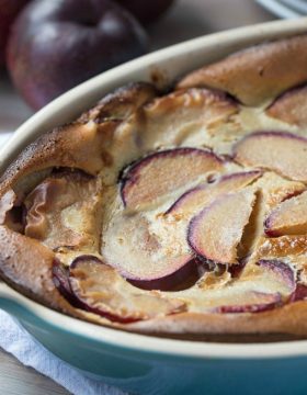 Melt in your mouth Plum Clafoutis is out of this world amazing and so easy to make, too! | This Gal Cooks