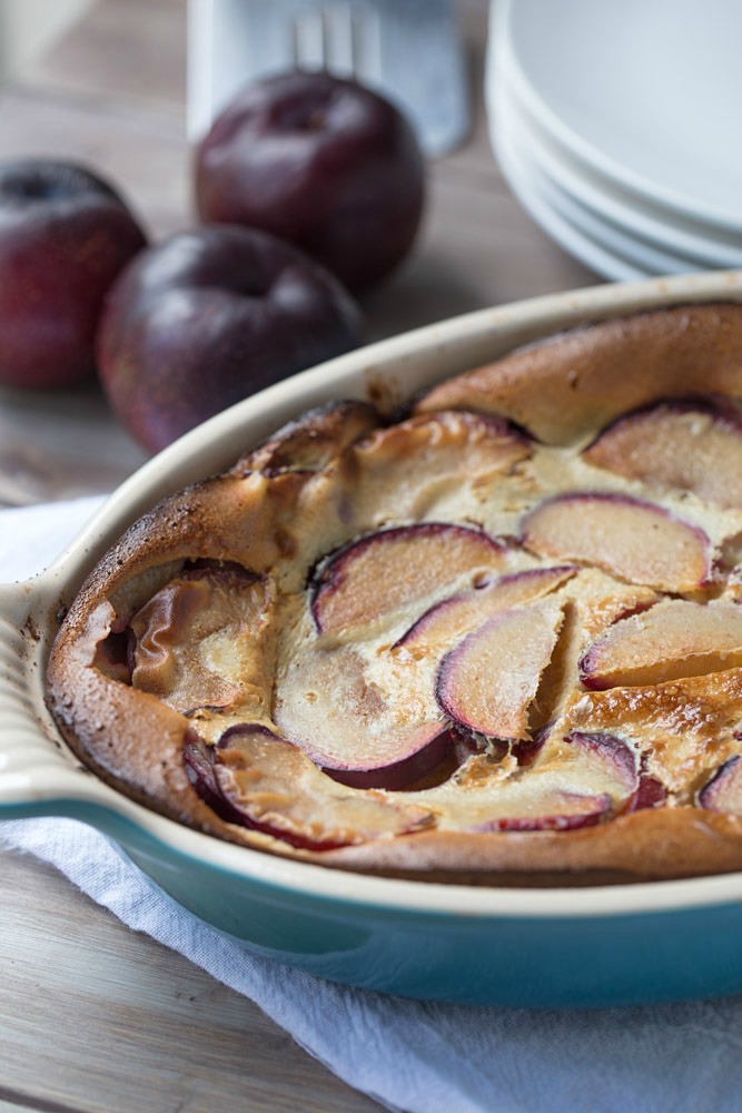 Melt in your mouth Plum Clafoutis is out of this world amazing and so easy to make, too! | This Gal Cooks