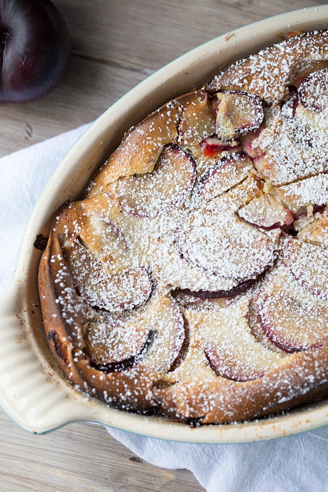 Melt in your mouth Plum Clafoutis is out of this world amazing and so easy to make, too! | This Gal Cooks