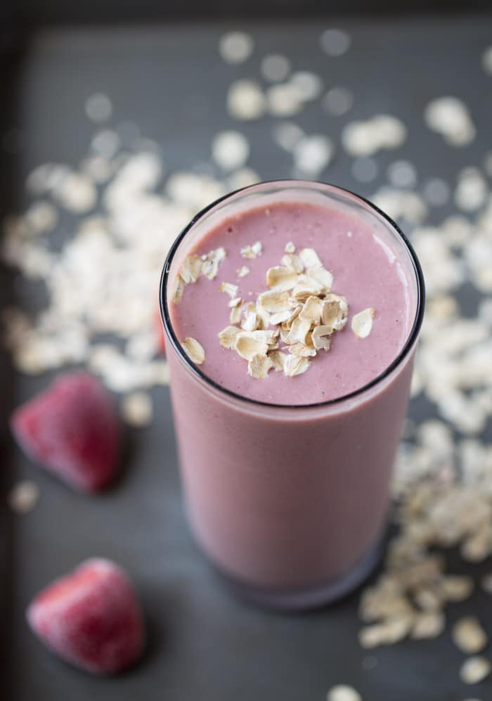 This Strawberry Banana Oatmeal Protein is super thick, creamy and will keep you full until lunchtime. Use gluten free oats to keep it gluten free! #smoothie #plantbased #breakfast #vegetarian #realfood #glutenfree